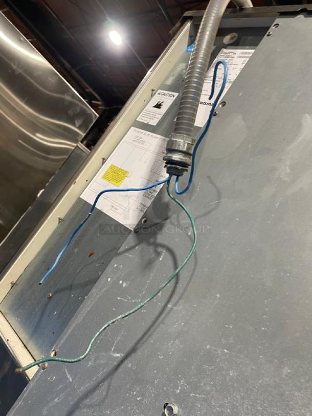 Scotsman Prodigy ice machine, model C1030SW-32B/BH900S-C, stainless steel, water-cooled, wires and labels visible.