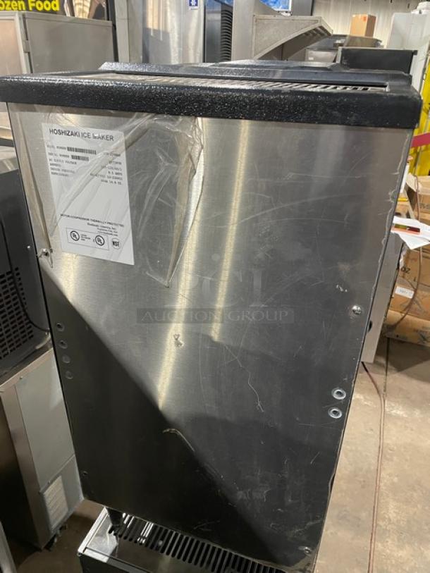 Hoshizaki DCM-270BAH ice/water dispenser, stainless steel, electric, air-cooled, with drip tray, model info label visible.