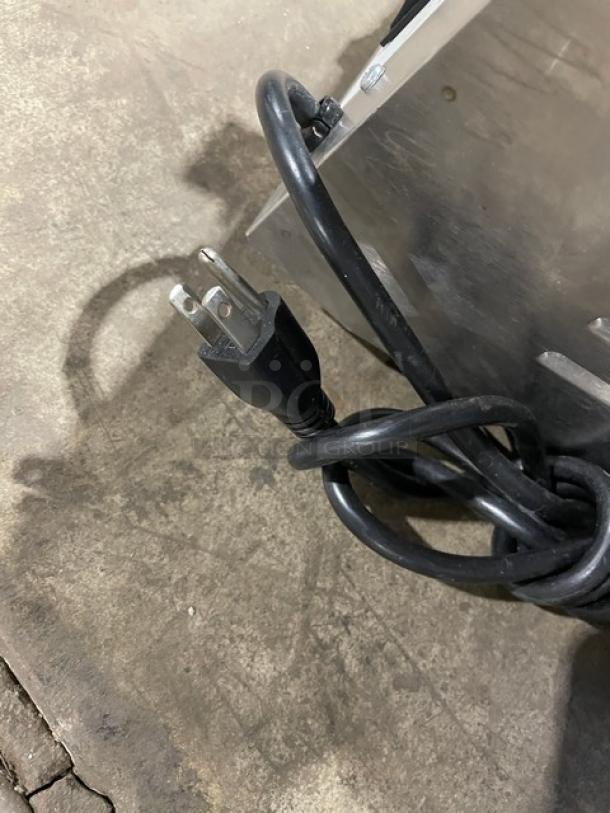 Gold Medal Econo Floss 3017SS cotton candy machine, stainless steel, electric, with power cord, model plate visible.