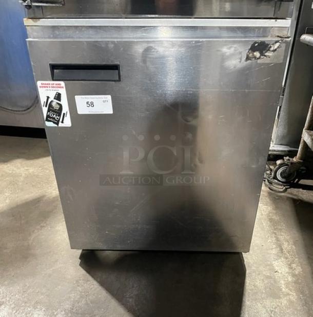 Delfield 406CA stainless steel single door undercounter refrigerator with poly-coated rack, on casters, minor wear visible.