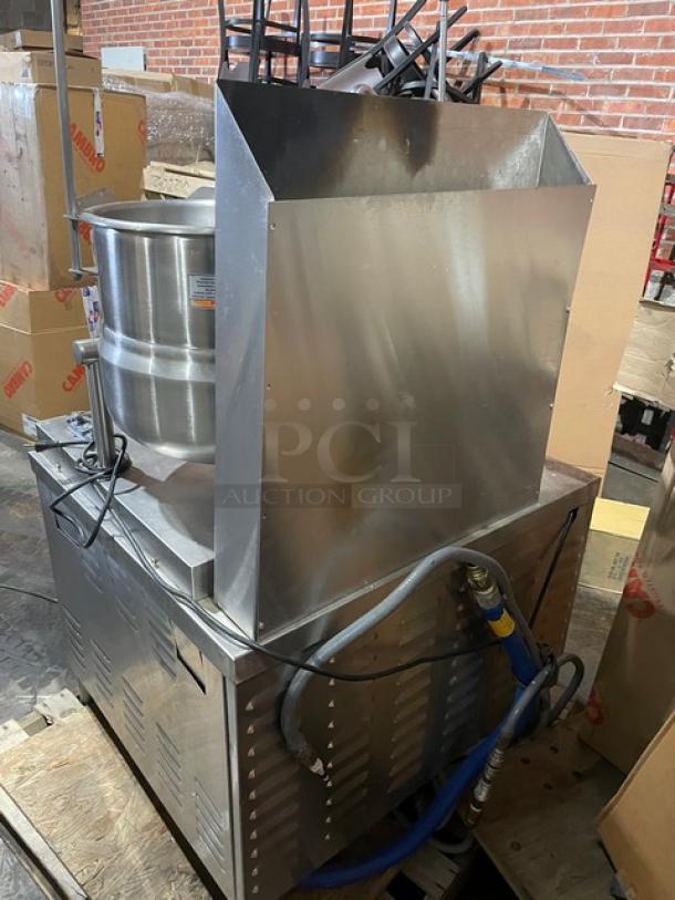 Market Forge stainless steel double self-contained tilting soup kettle, natural gas powered, on legs, good condition.