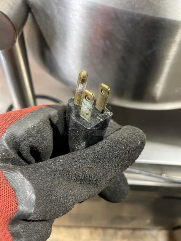 Market Forge stainless steel natural gas double tilting soup kettle on legs, showing power plug, used condition.