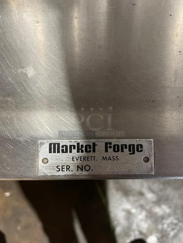 Market Forge stainless steel natural gas double tilting soup kettle, serial number 21851, on legs, working condition.