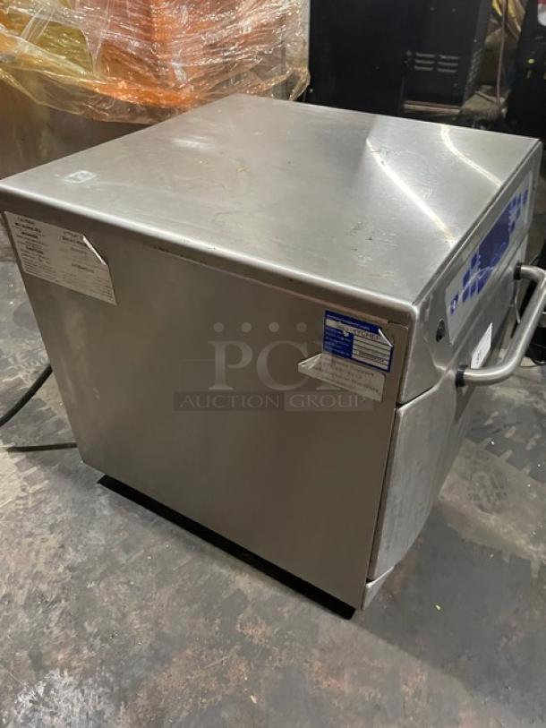 MerryChef 402S stainless steel rapid cook oven, electric-powered, 208V. Features control panel and labels. Serial: 0908004334.