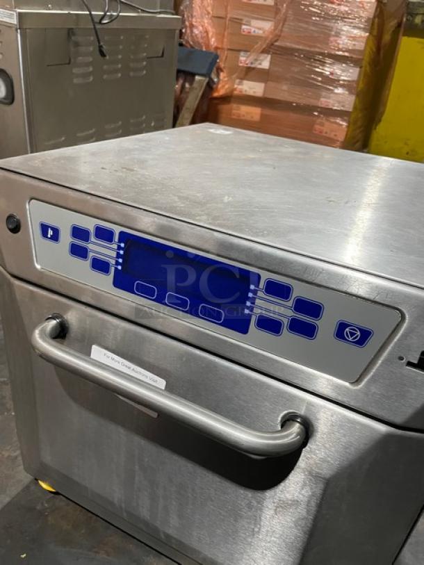 MerryChef 402S stainless steel rapid cook oven, electric powered, countertop model, 208V, blue control panel, used condition.
