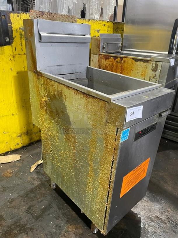 Vulcan Veg Series commercial deep fryer, stainless steel, natural gas, model 1VEG50M-1, with backsplash, basket hanger, on legs, used.