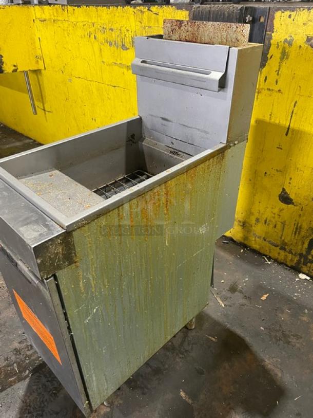 Vulcan Veg Series stainless steel deep fat fryer, model 1VEG50M-1, with backsplash and basket hanger, shows wear.