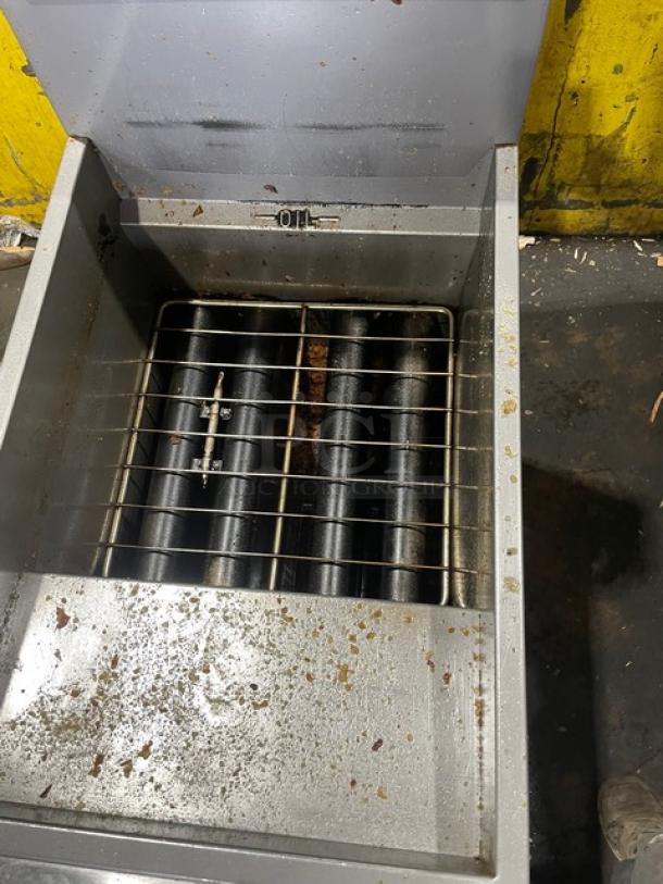 Vulcan Veg Series stainless steel gas fryer, Model 1VEG50M-1. Features backsplash and basket hanger. Used condition.