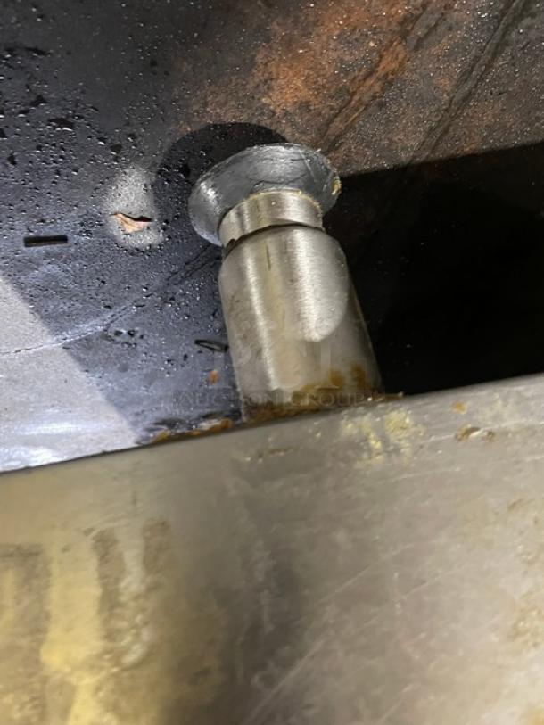 Star Ultra Max Series stainless steel natural gas flat griddle, commercial use, shown with adjustable leg, slightly worn.