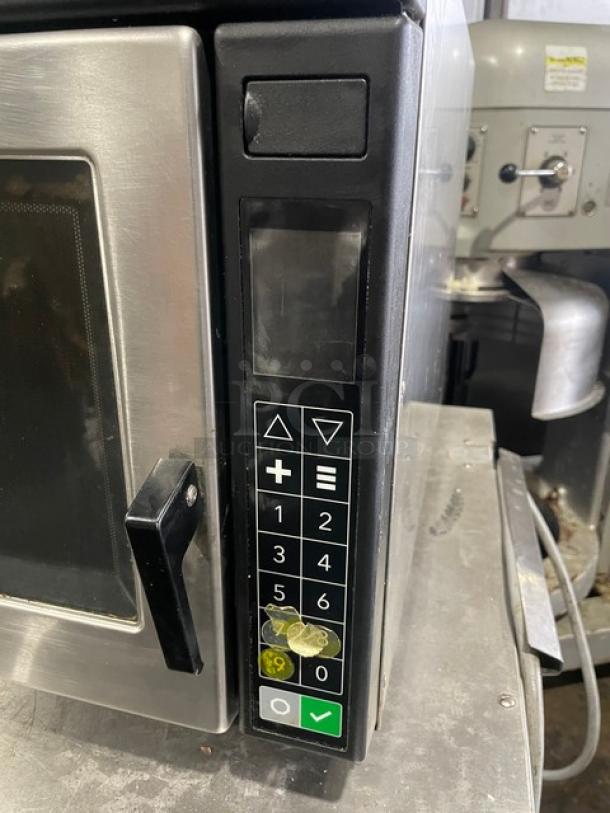 Amana RC30S2 stainless steel commercial microwave with programmable touchpad. Good condition, electric powered.