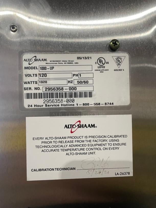 Alto Shaam 1000UP stainless steel electric dual compartment holding cabinet, 120V, model tag and serial number visible.
