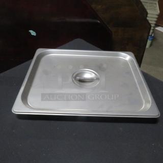 NEW 1/2 Size Hotel Lid 2XBID, stainless steel, sleek design, round handle, pristine condition, ideal for catering use.