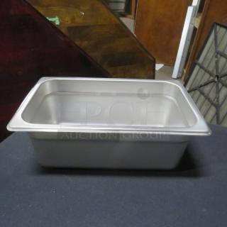 NEW 1/4 Size 4 Inch Deep Hotel Pan, stainless steel, pristine condition, ideal for catering and food service.