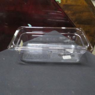 NEW Carlisle 1/3 Size 4 Inch Deep Food Storage Container, clear plastic, ideal for kitchen use, with visible label inside.