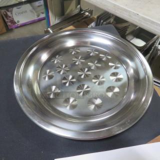 New 12" round stainless steel cater tray with polished surface and geometric pattern. Ideal for serving. Model: 3XBID.