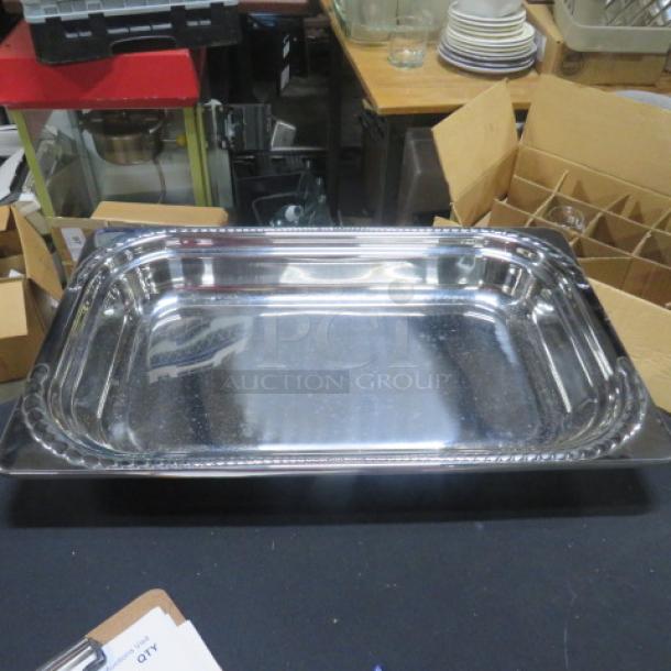 NEW Vollrath Super Pan, full size, 2.5" deep, model 82304. Made of stainless steel, excellent condition, reflective finish.
