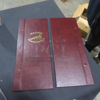 New maroon menu holder set with "Mad Fox Brewing Company" logo in gold. Includes two pieces with pre-punched holes for binding.