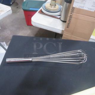 18-inch stainless steel whisk on display, excellent condition, featuring a sturdy handle and evenly spaced wires for effective mixing.