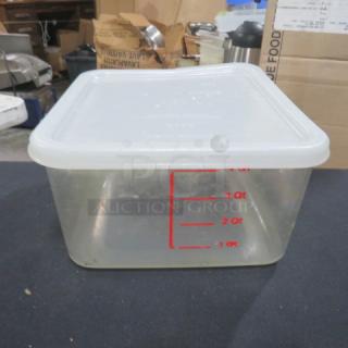 Clear 4-quart food storage container with lid, red measurement markings, good condition.