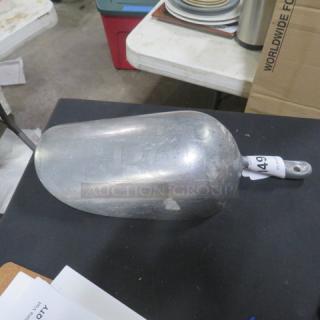85oz aluminum scoop with handle, used condition, showing light wear. Numbered tag on handle marked "49."