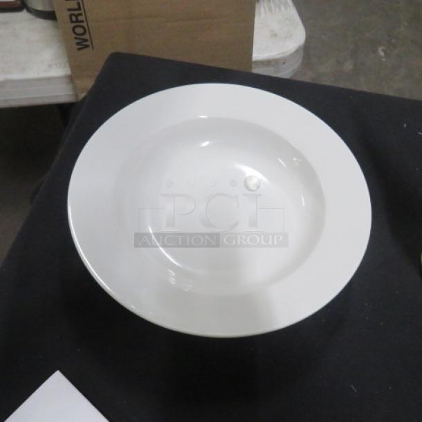9-inch Maxwell Williams bowl, white, smooth finish, excellent condition. Simple design, durable ceramic material. Ideal for table setting.