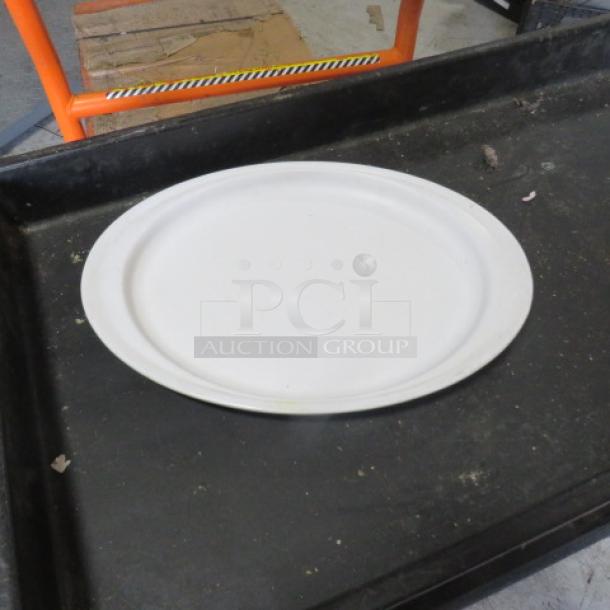 15x10.5 white poly platter, smooth finish, used condition. Perfect for serving or display purposes.