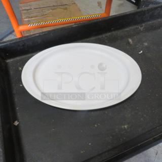 15x10.5 white poly platter, smooth finish, used condition. Perfect for serving or display purposes.