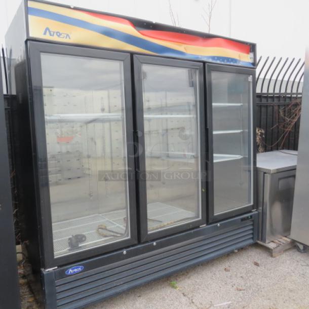 Atosa 3-door glass display cooler, model MCF8724GR. Nine racks, on casters, 81x32x81 inches. Price: $4499.00.