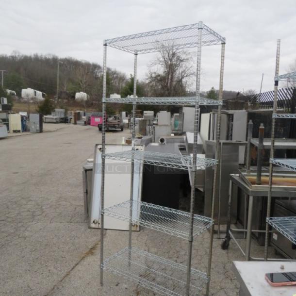 Metro shelf unit with five wire shelves, 36x18x87 inches. Used condition, sturdy metal construction, ideal for storage.