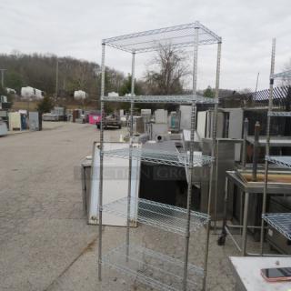 Metro shelf unit with five wire shelves, 36x18x87 inches. Used condition, sturdy metal construction, ideal for storage.