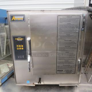 Accutemp electric boilerless steamer, model E62083D15000250, 208V, 23x26x28.5 inches, stainless steel, excellent condition.