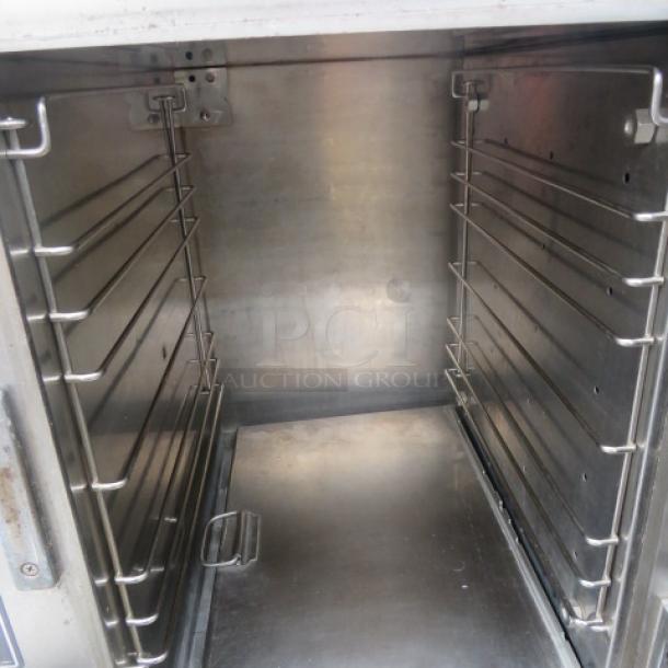 Accutemp electric boilerless steamer, Model E62083D15000250, 208 Volt, 23x26x28.5 inches, stainless interior, excellent condition.