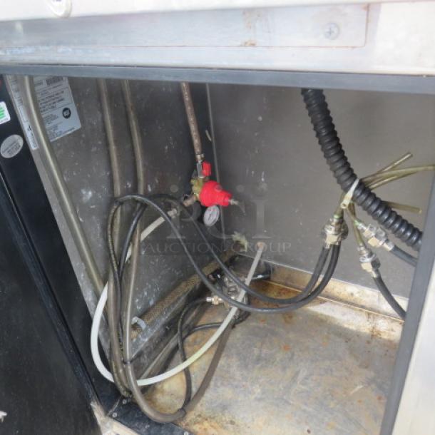 Perlick Kegorator Model DS60BLT with 1 tower, 4 taps, and casters. Interior view shows tubing and wiring. 115 Volt, dimensions: 60x25x38.5 inches.