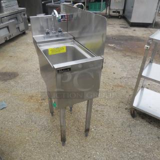 Perlick under bar hand sink with faucet, backsplash, and right side splash, 12x24x35.5 inches. Stainless steel, labeled.