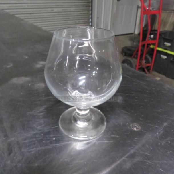 Brandy glass with a wide bowl and short stem; clear glass in excellent condition. No visible labels. Model: 10XBID.