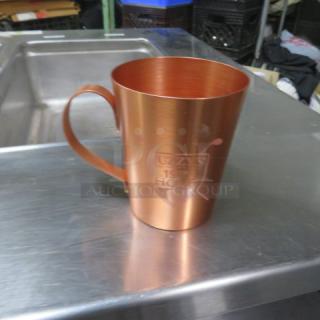 New copper mule mug with handle, engraved with "UZAY'S 19TH HOLE" logo. In excellent condition, model 5XBID.
