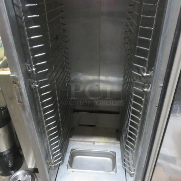 Cozoc Heat and Hold Cabinet, Model HPC7008, on casters. 120 Volt, 22x31x67 inches, stainless steel interior, excellent condition.