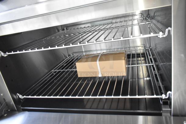 Brand new 2024 RC-ENR6B36TJ-NAT stainless steel 6 burner range and oven interior with racks, featuring natural gas power, 210,000 BTU.