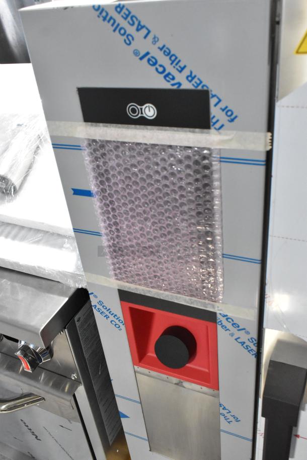 Brand new Bakers Pride stainless steel combi convection oven, scratch and dent. Features bubble wrap and protective film.