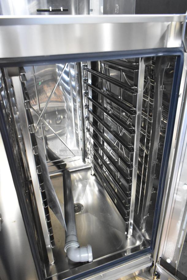 BRAND NEW Bakers Pride stainless steel combi convection oven, commercial grade, with slight cosmetic scratches, spacious interior.