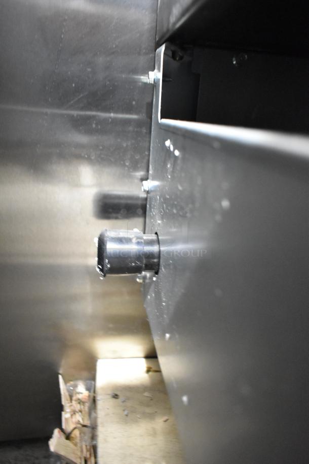 BRAND NEW 2024 Hangzhou ENCTGM-72-L/N stainless steel countertop natural gas flat top griddle, 180,000 BTU, showing side view.