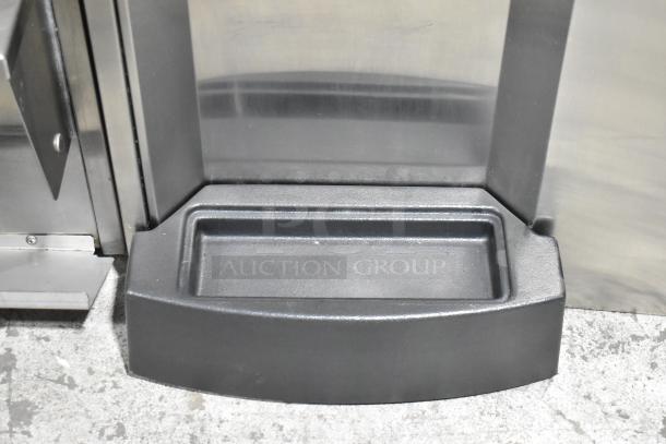 Stainless steel base of 2024 Stoelting F131-38I2 soft serve ice cream machine showing sturdy construction and clean condition.