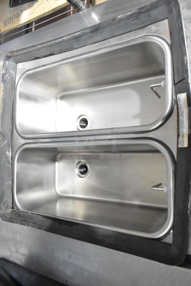 2024 Stoelting F131-38I2 stainless steel 2-flavor twist soft serve machine. Features dual hoppers, new condition.