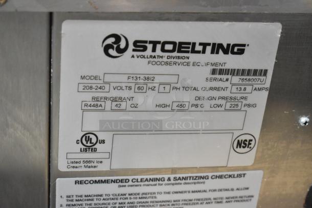 2024 Stoelting F131-38I2 soft serve machine label showing model, voltage, refrigerant, and UL/NSF certifications.