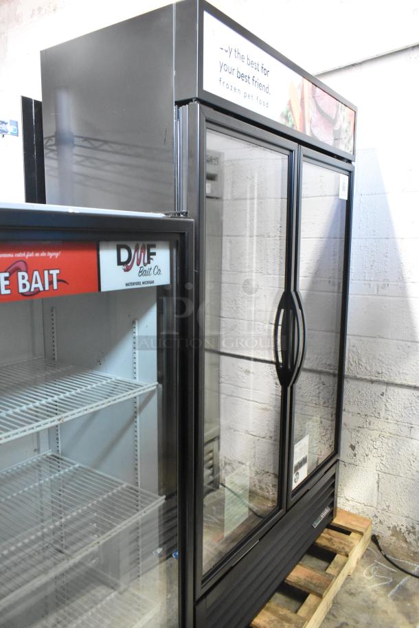 Brand new 2025 True GDM-43F-SL-HC 2-door reach-in cooler, metal finish, poly-coated racks, 115V, 1-phase, minor scratches.