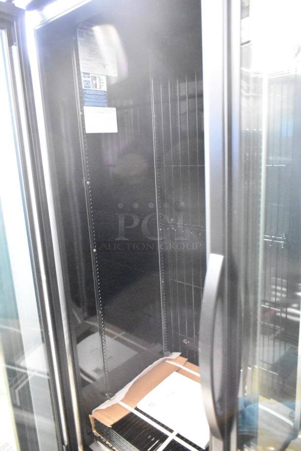 Brand new True GDM-43F-SL-HC commercial cooler, 2-door, poly-coated racks, 115V, slight scratches, ideal for merchandising.