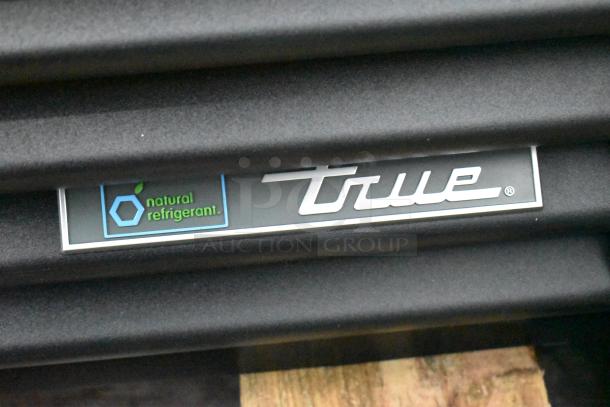 True GDM-43F-SL-HC cooler label with "natural refrigerant" marking, indicating eco-friendly design.