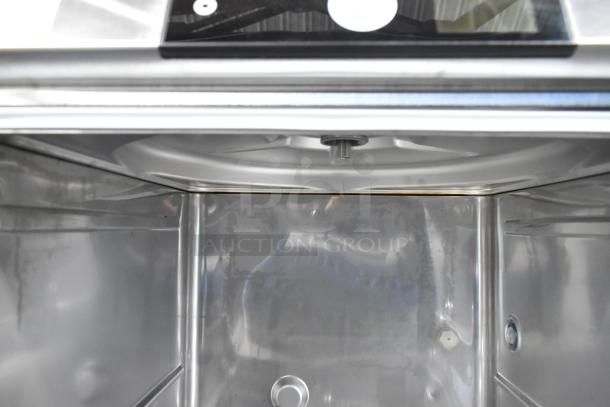 2025 Hobart LXNH stainless steel commercial undercounter dishwasher interior. New condition, high temperature, model details visible.