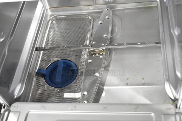 2025 Hobart LXNH stainless steel commercial undercounter dishwasher interior, showing filter and spray arm, new condition.