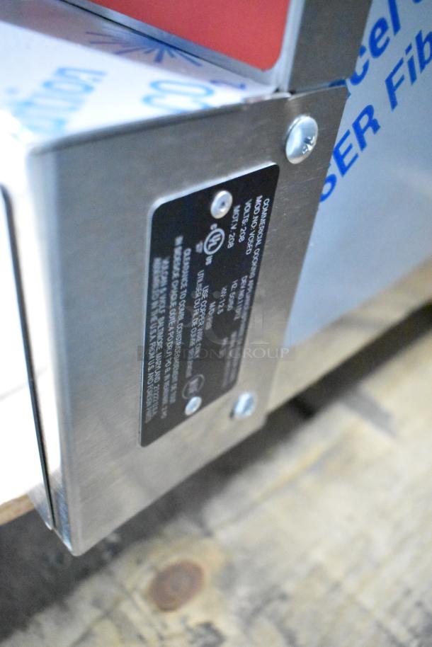 Stainless steel plate on Vulcan VC5ED convection oven, showing model and voltage details.